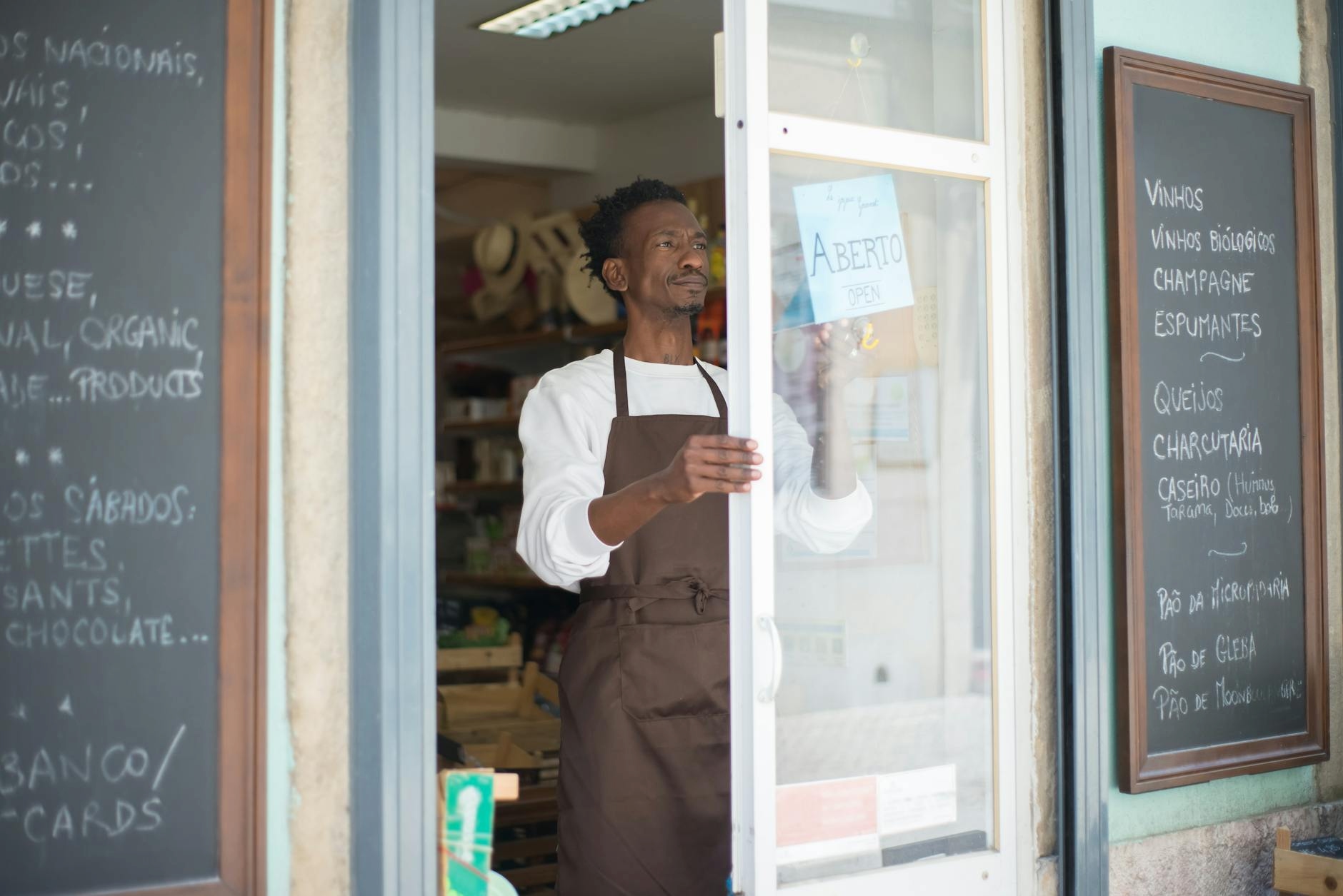 Small business owner reviewing a monthly budget spreadsheet on a laptop.